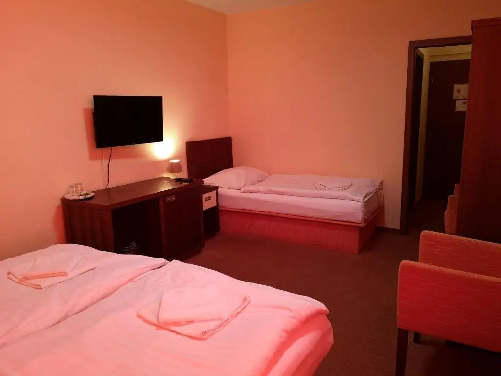 Garni Hotel Cosmopolitan - Chambres