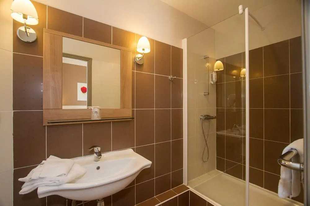 Logis Hotel Le Majestic - Chambres
