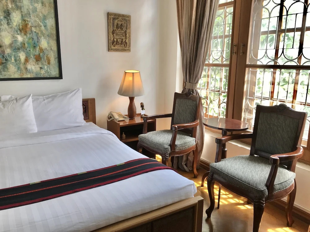 Classique Inn - Chambres