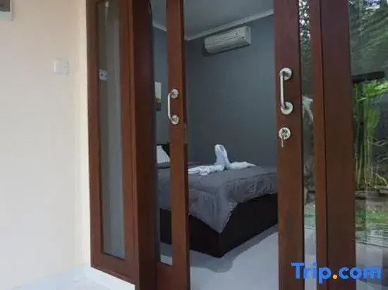 Двухместный номер Standard с видом на сад двуспальная кровать в Mai Guesthouse Sanur