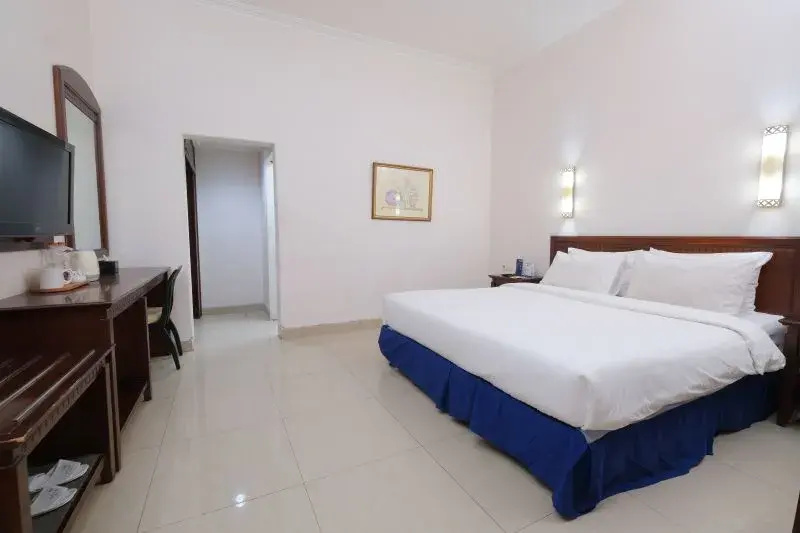 Grand Orchid Hotel - Chambres
