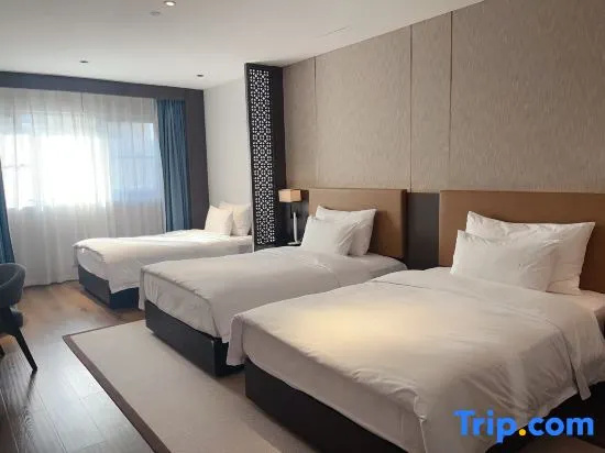 Haiyi Hotel - Chambres