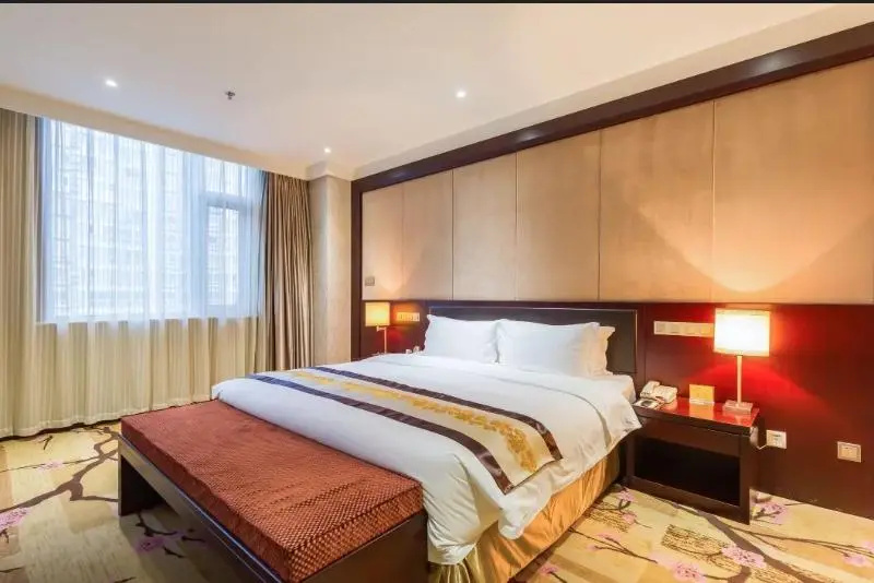 Junyi Runhua Hotel - Chambres