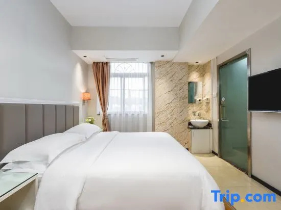 Jinyi Hotel - Chambres