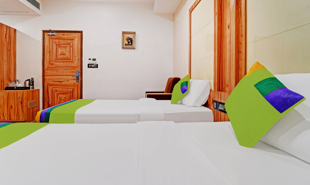 Treebo Vinayak Inn - Chambres
