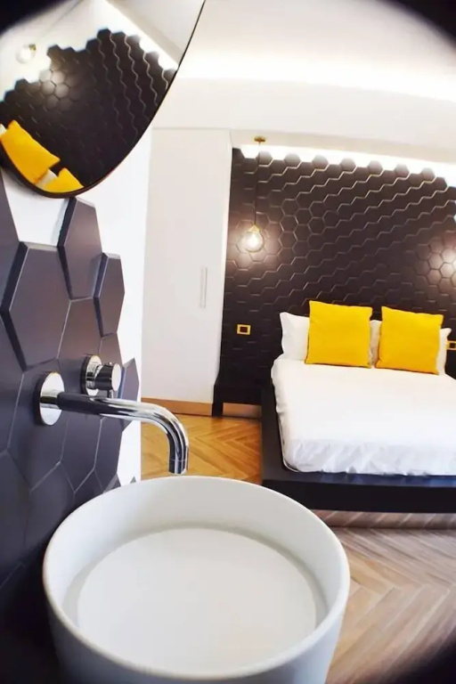 Comfort room with balcony and with partial sea view