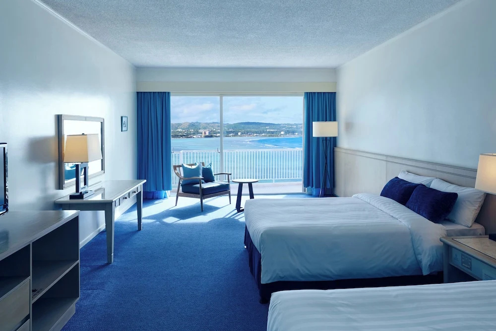 Premier Quadruple room with balcony and oceanfront