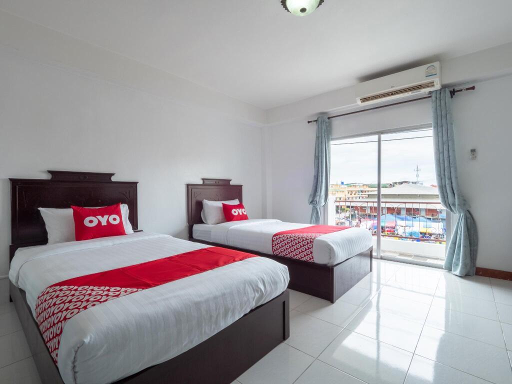 Двухместный номер Deluxe 2 отдельные кровати в OYO 1123 The One Health Care and Apartment
