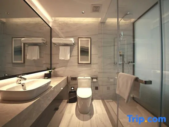 Huayun Hotel - Chambres