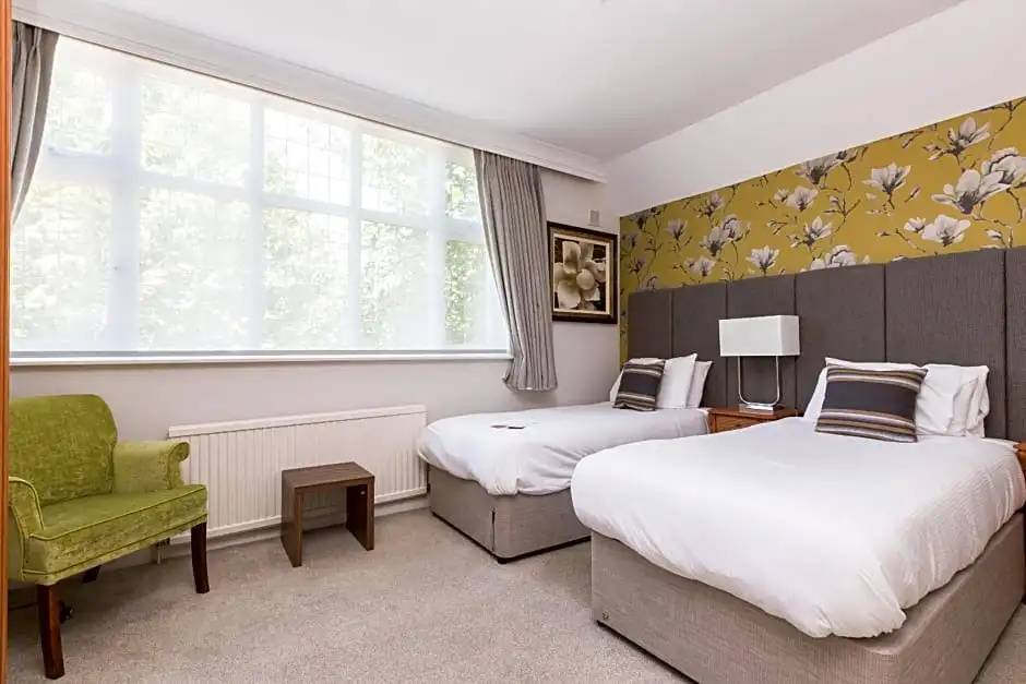 De Rougemont Manor Hotel & Suites - Chambres