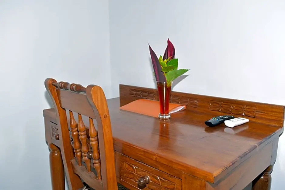 Chukwani Executive Inn - Chambres