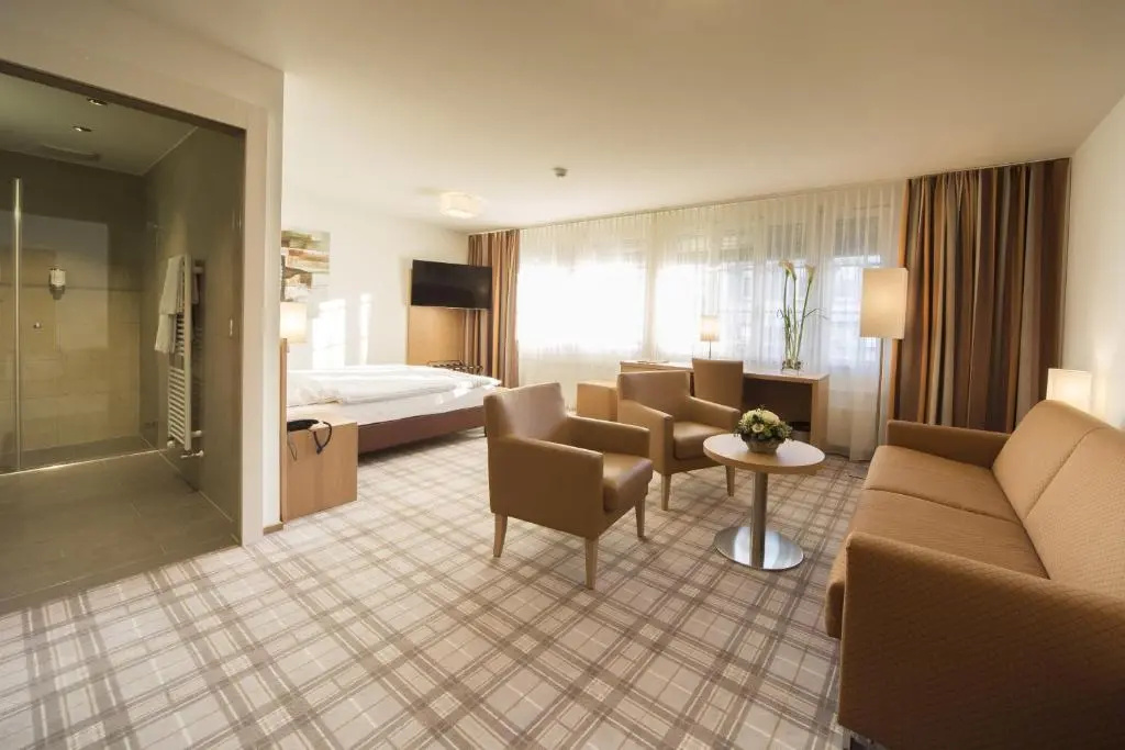 Central City Hotel Rochat - Chambres