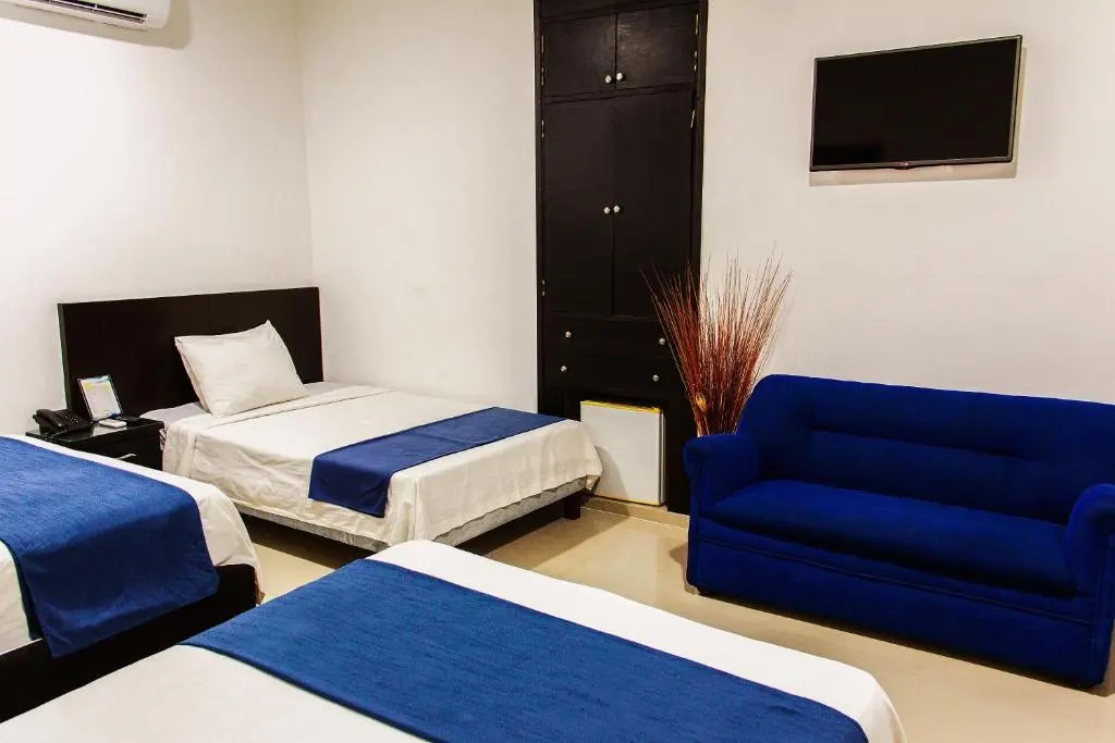 Hotel la Ciudad - Chambres