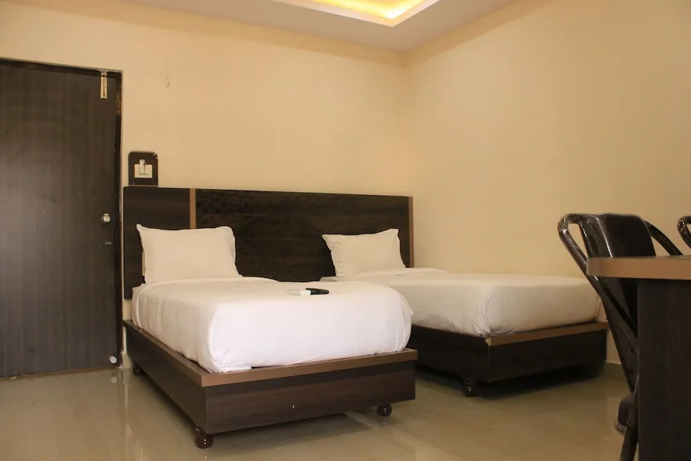 Hotel Asian International - Chambres