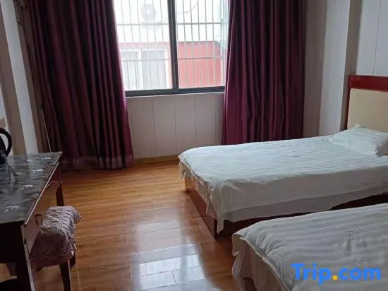 Jin Tai Hotel - Chambres