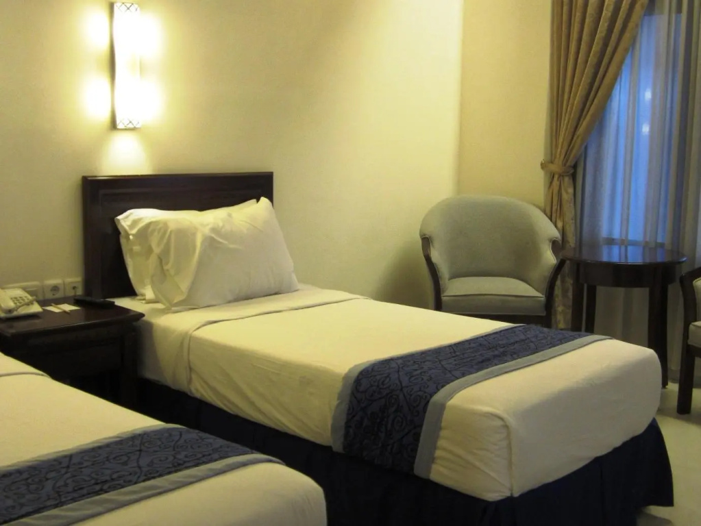 Grand Orchid Hotel - Chambres