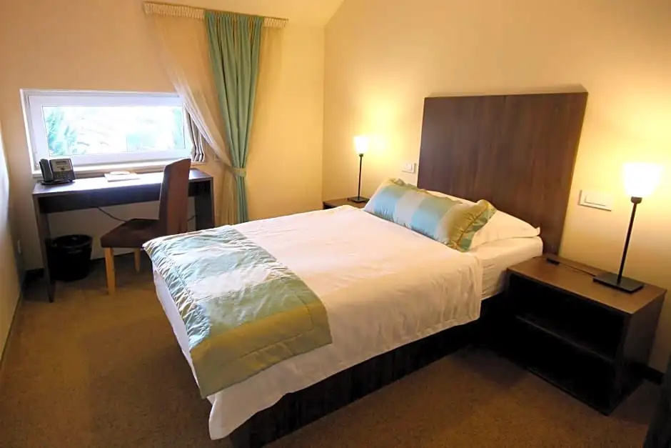 Ambient Hotel - Chambres