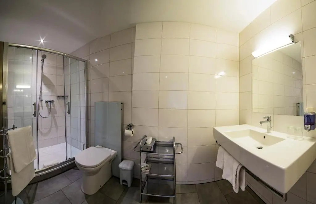 Central Garni - Chambres