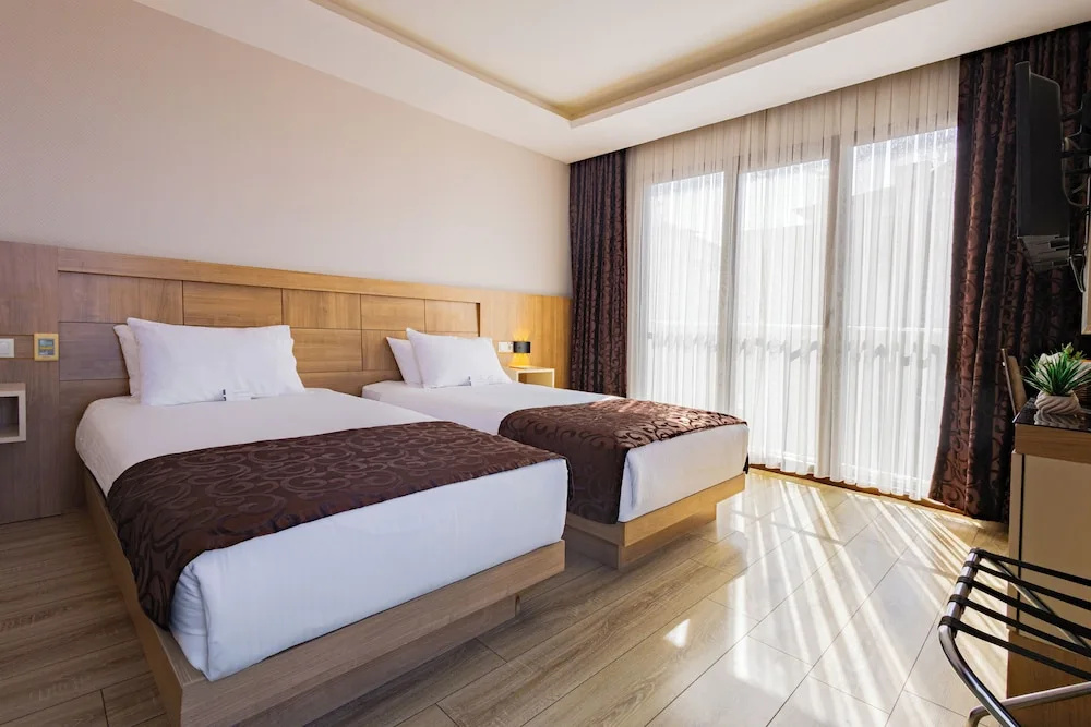 1 Bedroom Deluxe Triple room