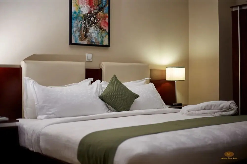 Golden Bean Hotel - Chambres
