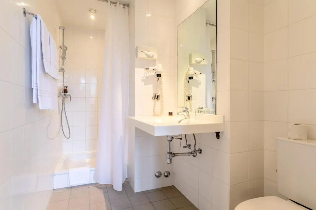 Alma Grand Place Hotel - Chambres