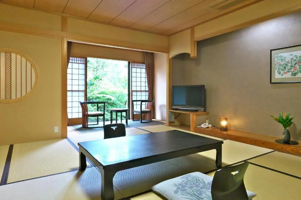 Yuraku Hotel - Chambres