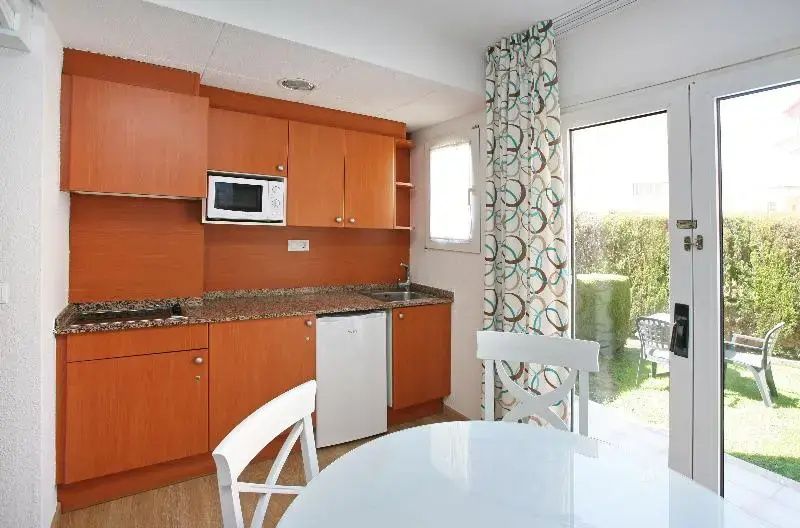 Apartamentos Turísticos Jardines del Plaza - Chambres