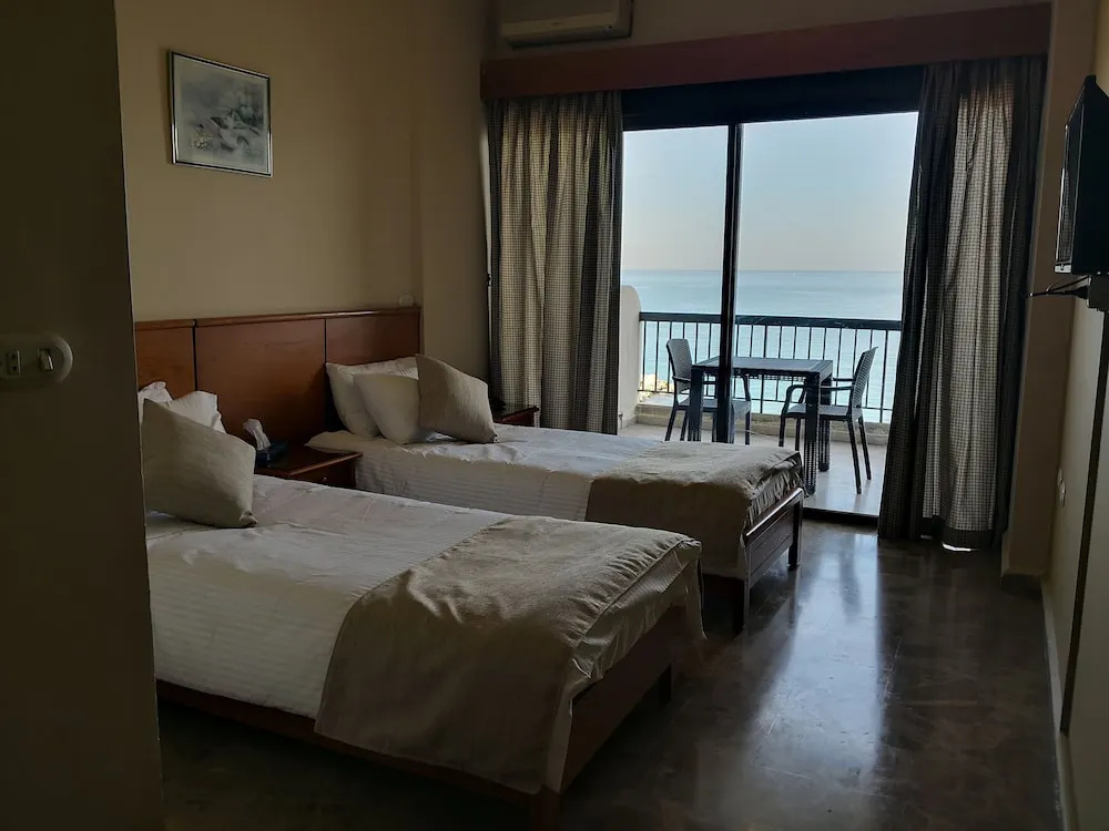 Holiday Suites Hotel And Beach - Chambres