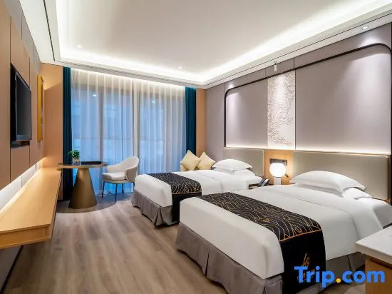 Huagang Hotel - Chambres