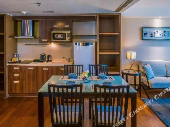 Jingguang Center Apartment Hotel - Chambres