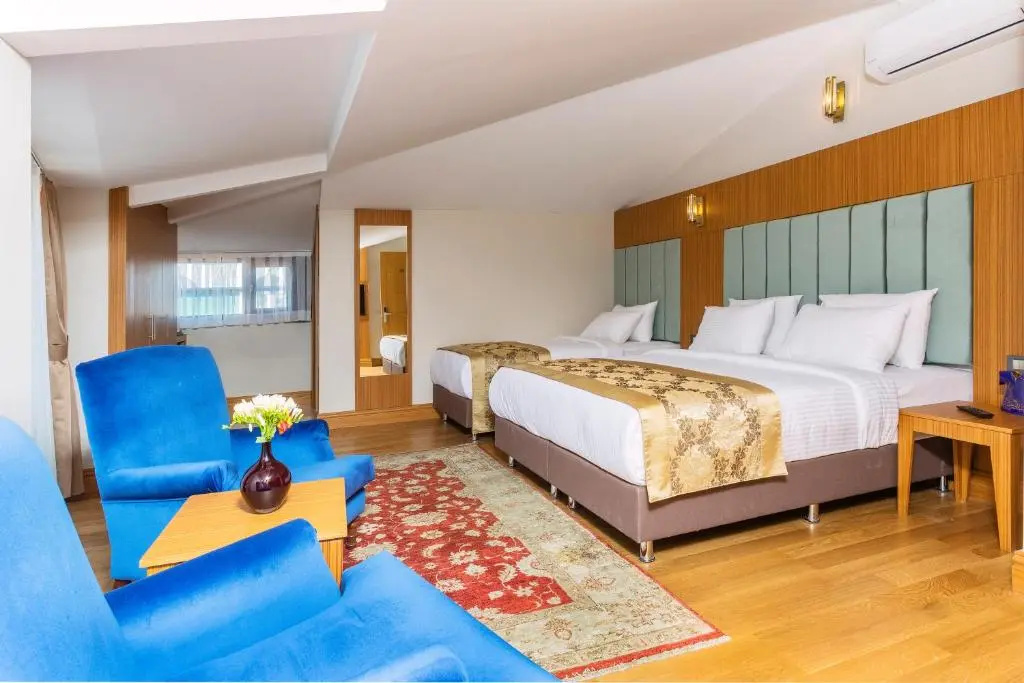 Acra Special Class Hotel - Chambres