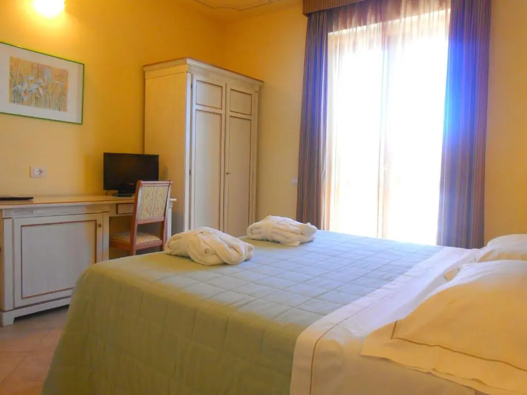 Hotel Saturno Fontepura - Chambres