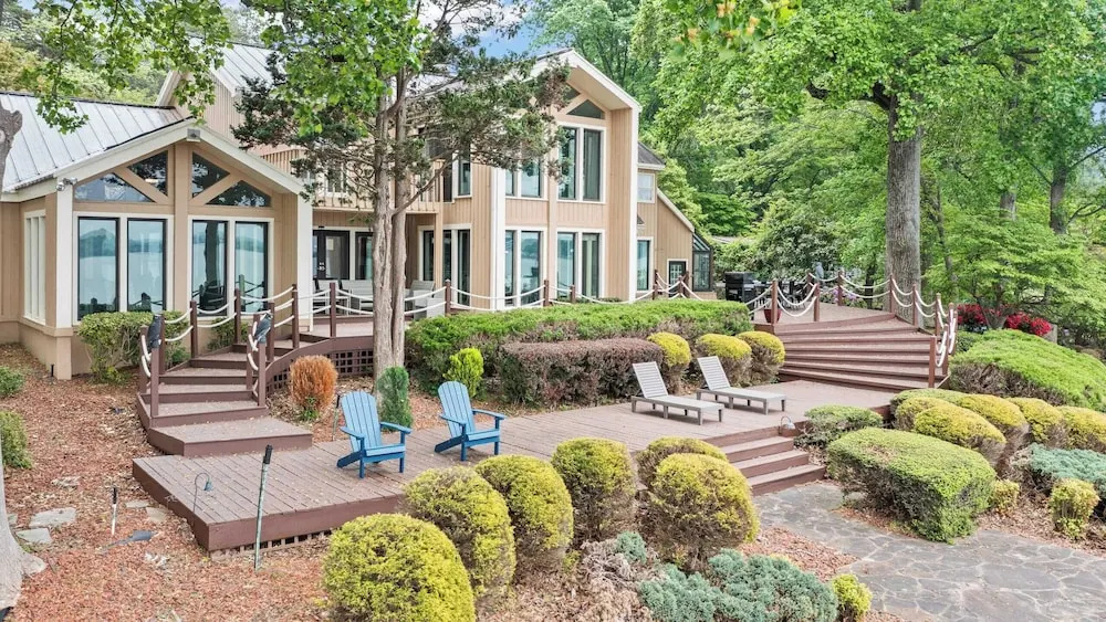 Waterfront Stay w/ Canoes, Deck, Game Room & Lake Views Near Mooresville Renwick Cove by Avantstay