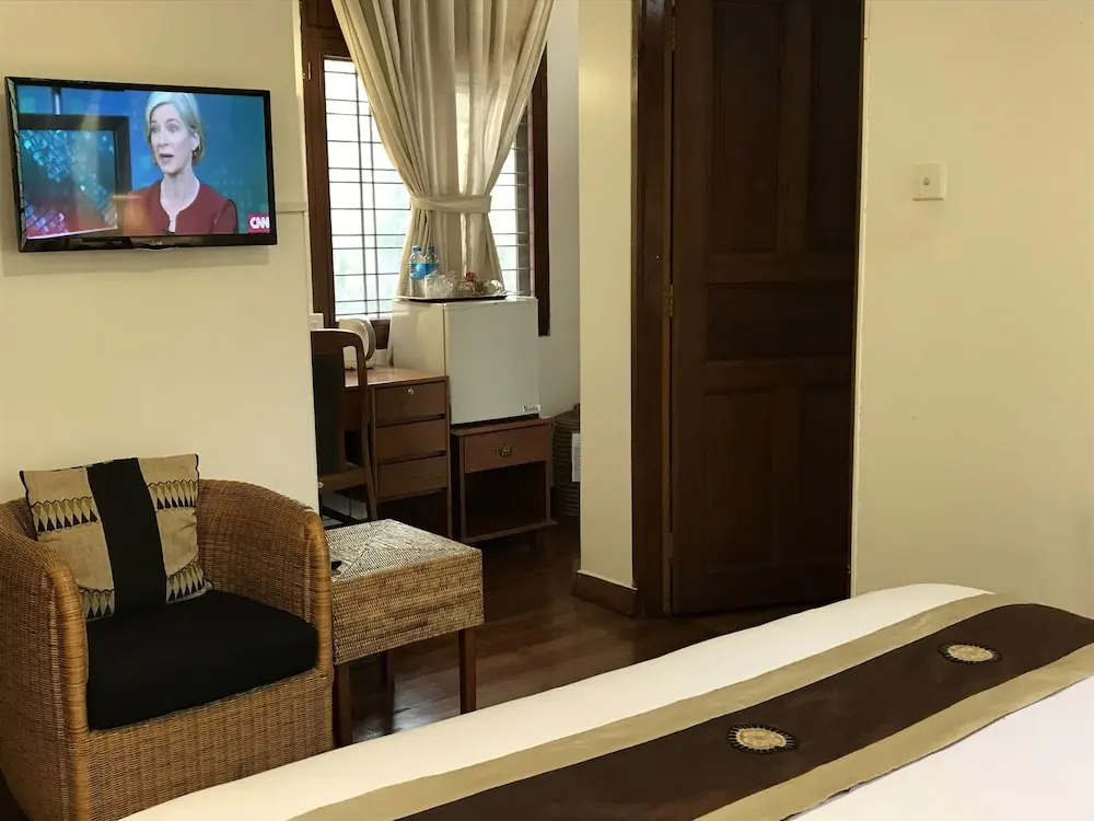Classique Inn - Chambres