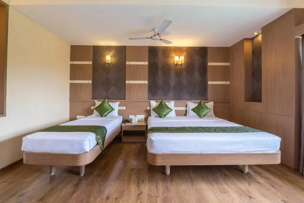 Treebo ESS Grande - Chambres