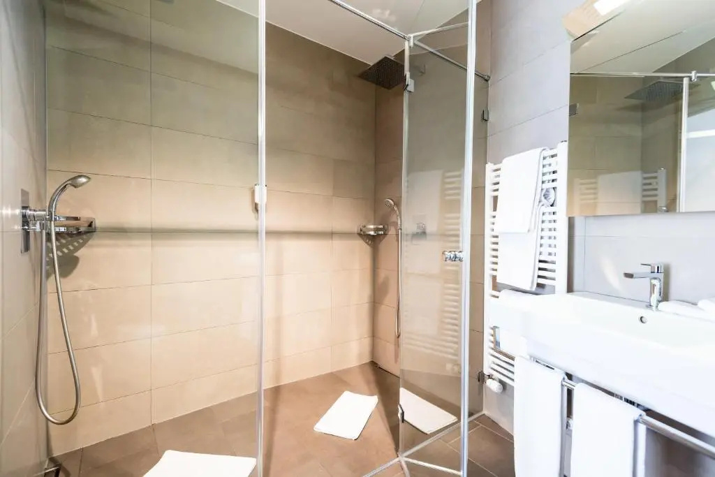 Central City Hotel Rochat - Chambres