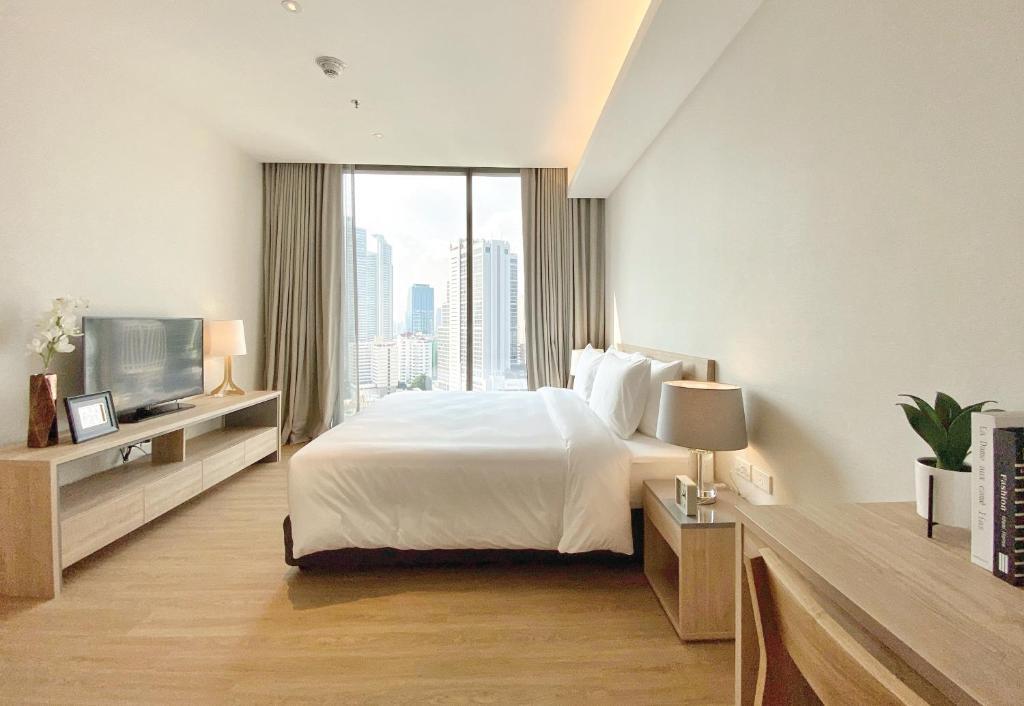 Апартаменты Executive с 2 комнатами в Oakwood Suites Bangkok