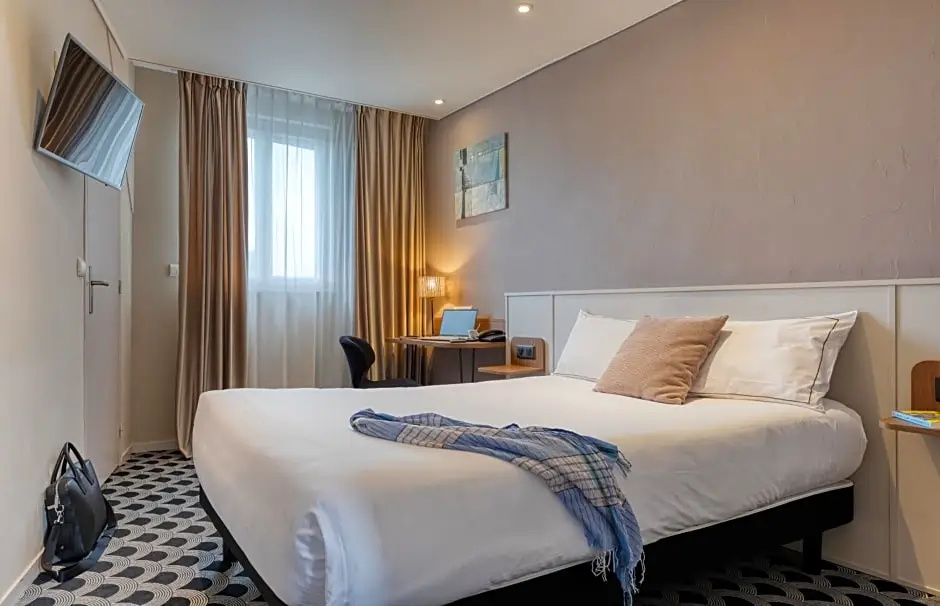 Brit Hotel Les Voyageurs - Chambres