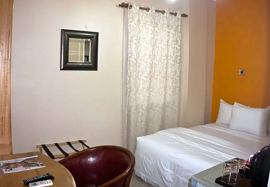Tropical Enclave Hotel - Chambres