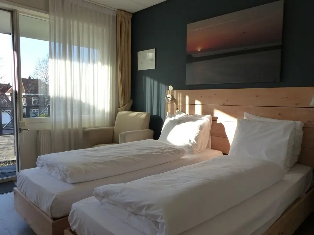 Hotel De Stadsherberg - Chambres