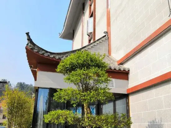 New Beacon Yunman Internation Hotel (Yingshan Chaxiang Small Town)