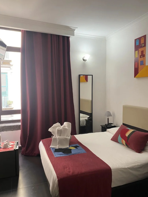 Hotel Plebiscito Aparthotel - Chambres