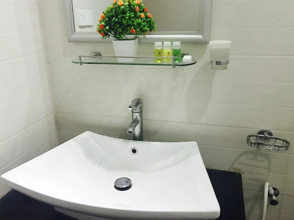 Palm Grove Holiday Inn - Chambres