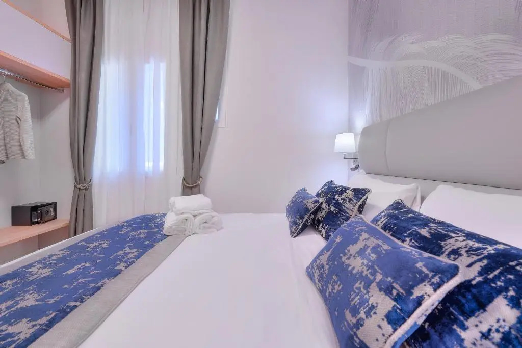 Hotel Cosmos - Chambres