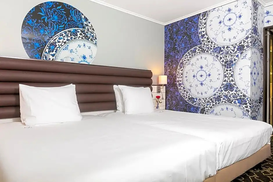 Golden Tulip Hotel Central - Chambres