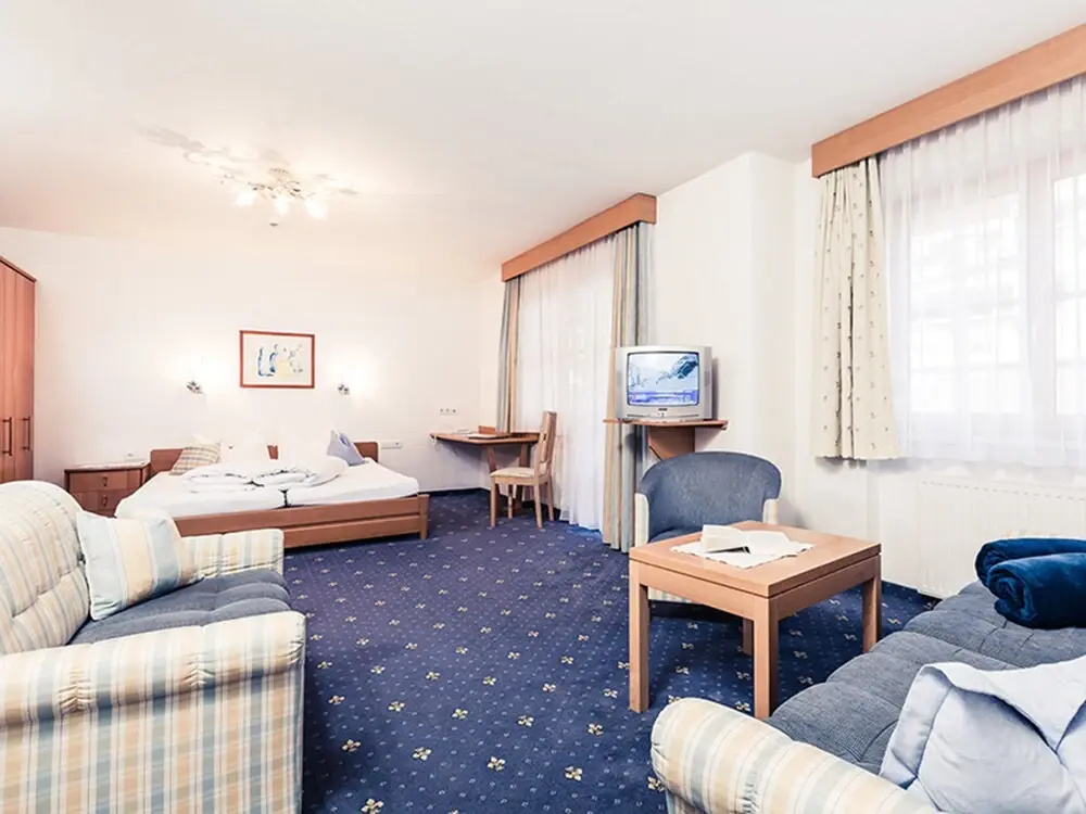Andre Arnold - Boutique Pension - Chambres