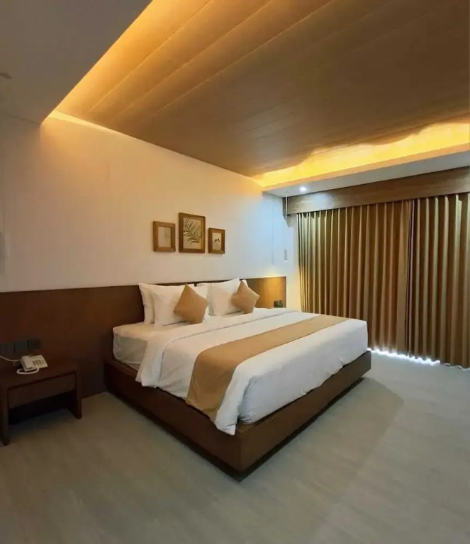 Deluxe Double room with balcony and with pool view (full double bed)
