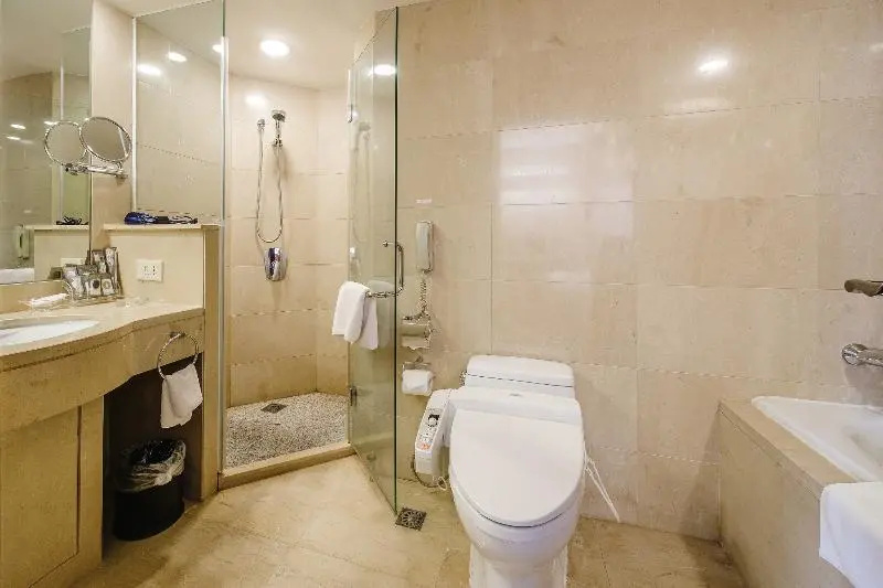 Grand Continent International Hotel - Chambres
