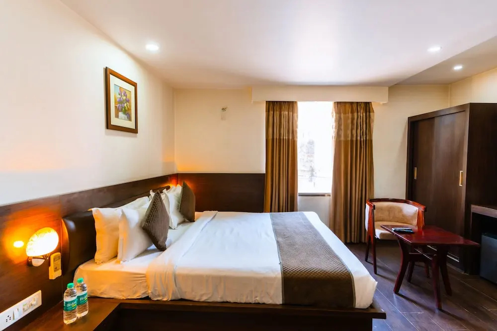 Hotel Krishna by KeyMagics - Chambres