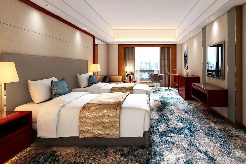 Manhattan Kinlen Hotel - Shishi - Chambres